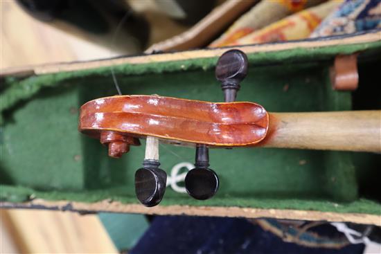 A German three-quarter size violin and bow, cased